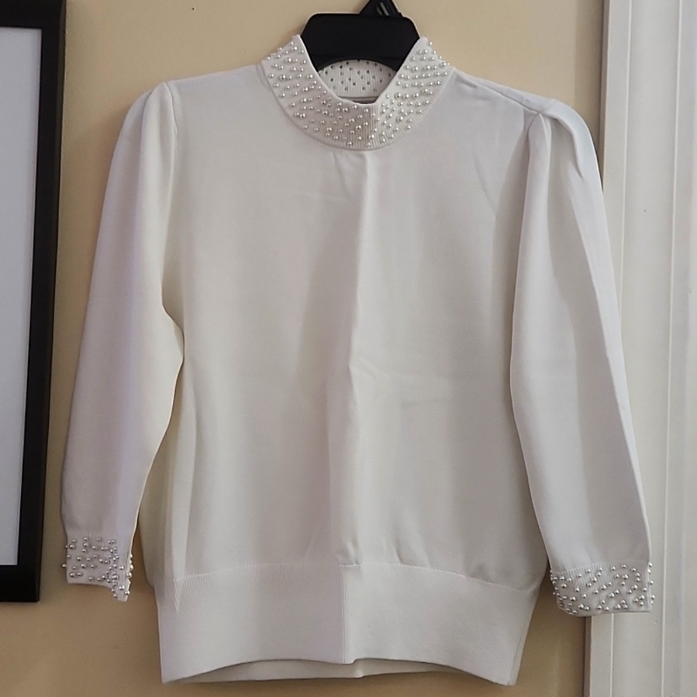 H&M cream color top with pearls accents